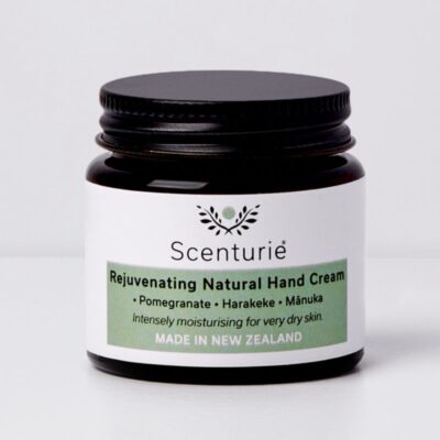 Scenturie's multi-award-winning Rejuvenating Natural Hand Cream in plastic-free amber glass jar and aluminium lid.