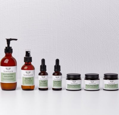 Scenturie Ultimate Natural Skincare Set featuring seven full-sized luxury amber glass skincare products: Cleanser, Toner, Espresso Scrub, Bakuchiol Serum, Face Oil, Day Cream, and Night Cream. Handcrafted in Aotearoa.